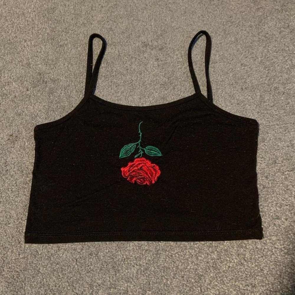 Simple black top with a rose